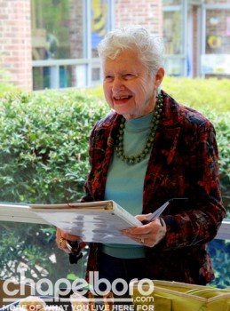 Gladys Siegel looks happy volunteering.