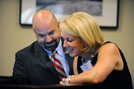 aaron nelson and paige zinn prepare remarks